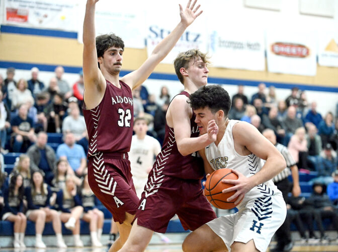 Tigers outlast rival Mountain Lions to win opener
